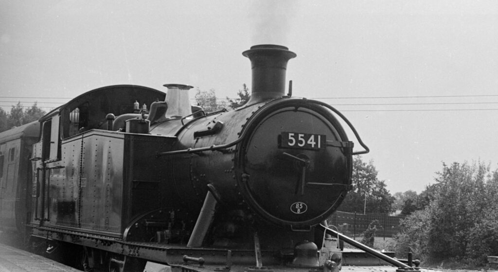 An old steam train engine, with it’s number on the front plate.